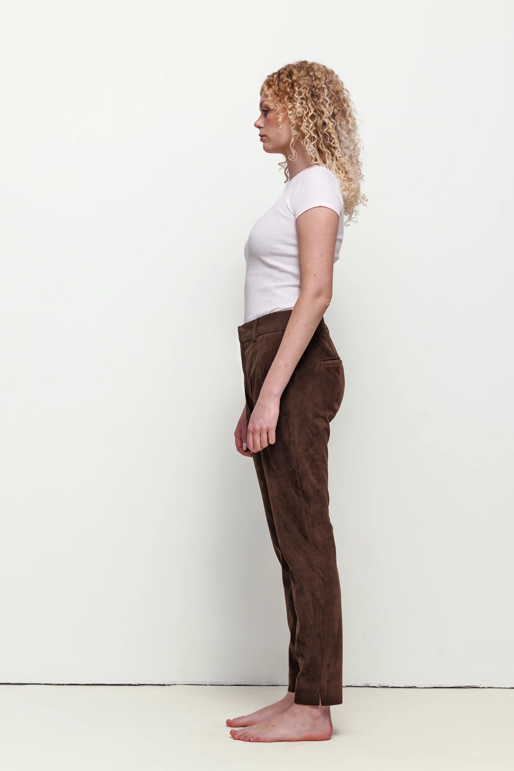 a woman with curly blonde hair