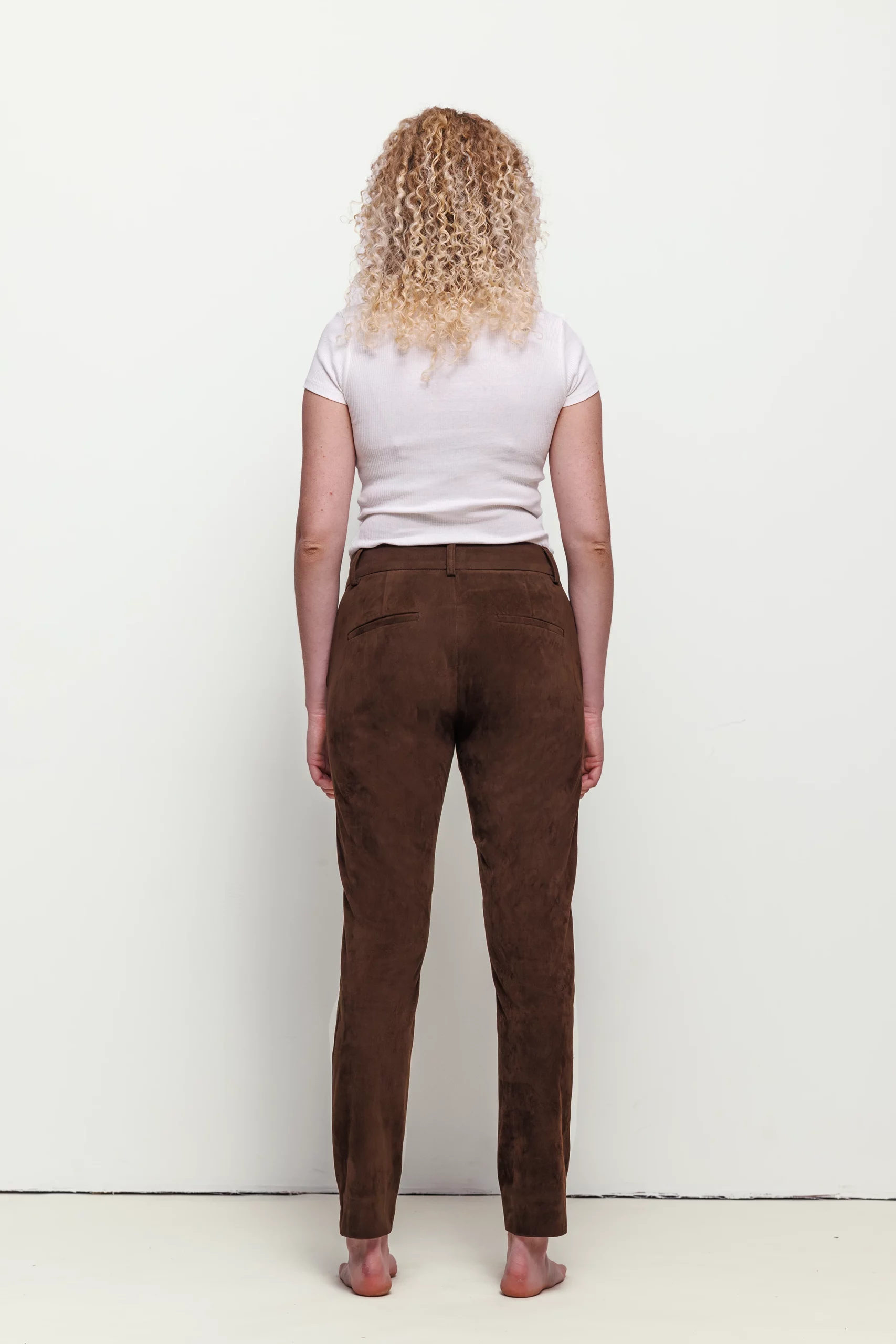 a woman with curly blonde hair