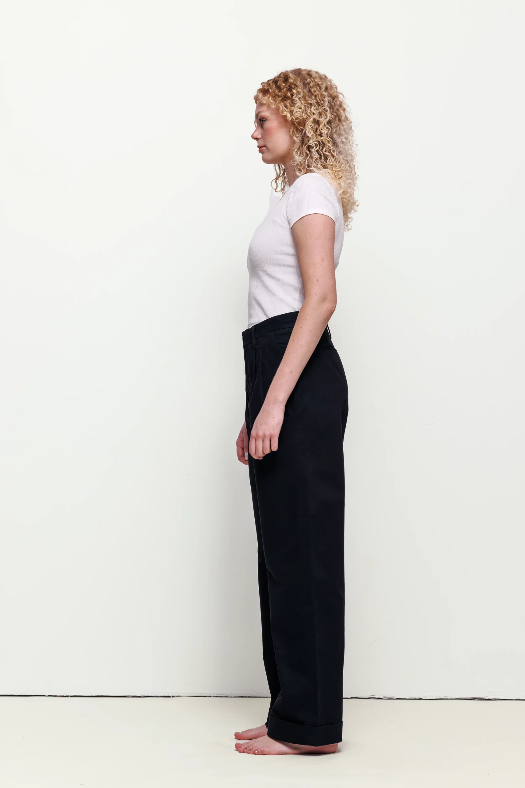 a woman with curly blonde hair
