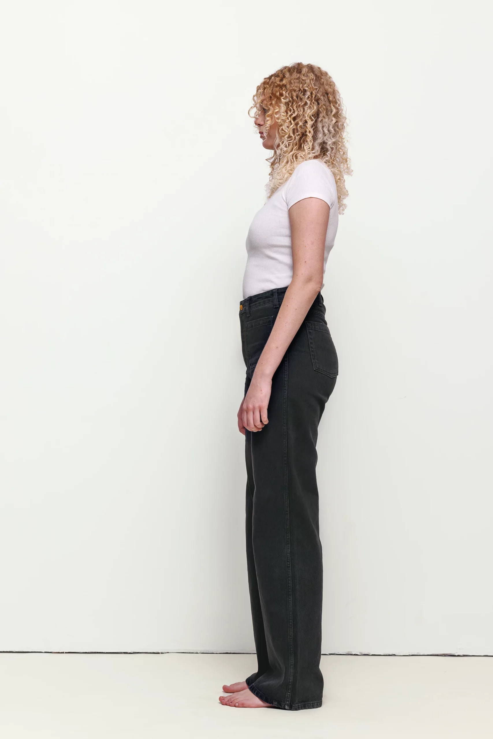 a woman with curly blonde hair