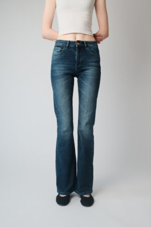Girl wearing blue denim jeans with extra long legs