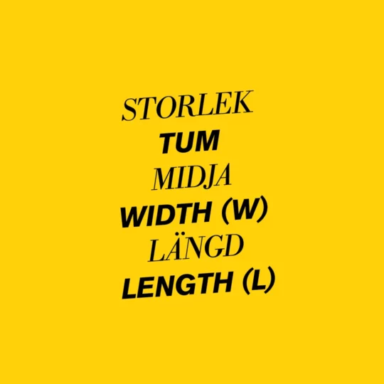 Gul box med text om storlek i tum, waist och lenght.